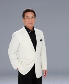 弦哲也